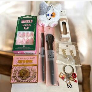 Assortment of Beauty Products and accessories Pat McGrath Divine Bronzer Blush